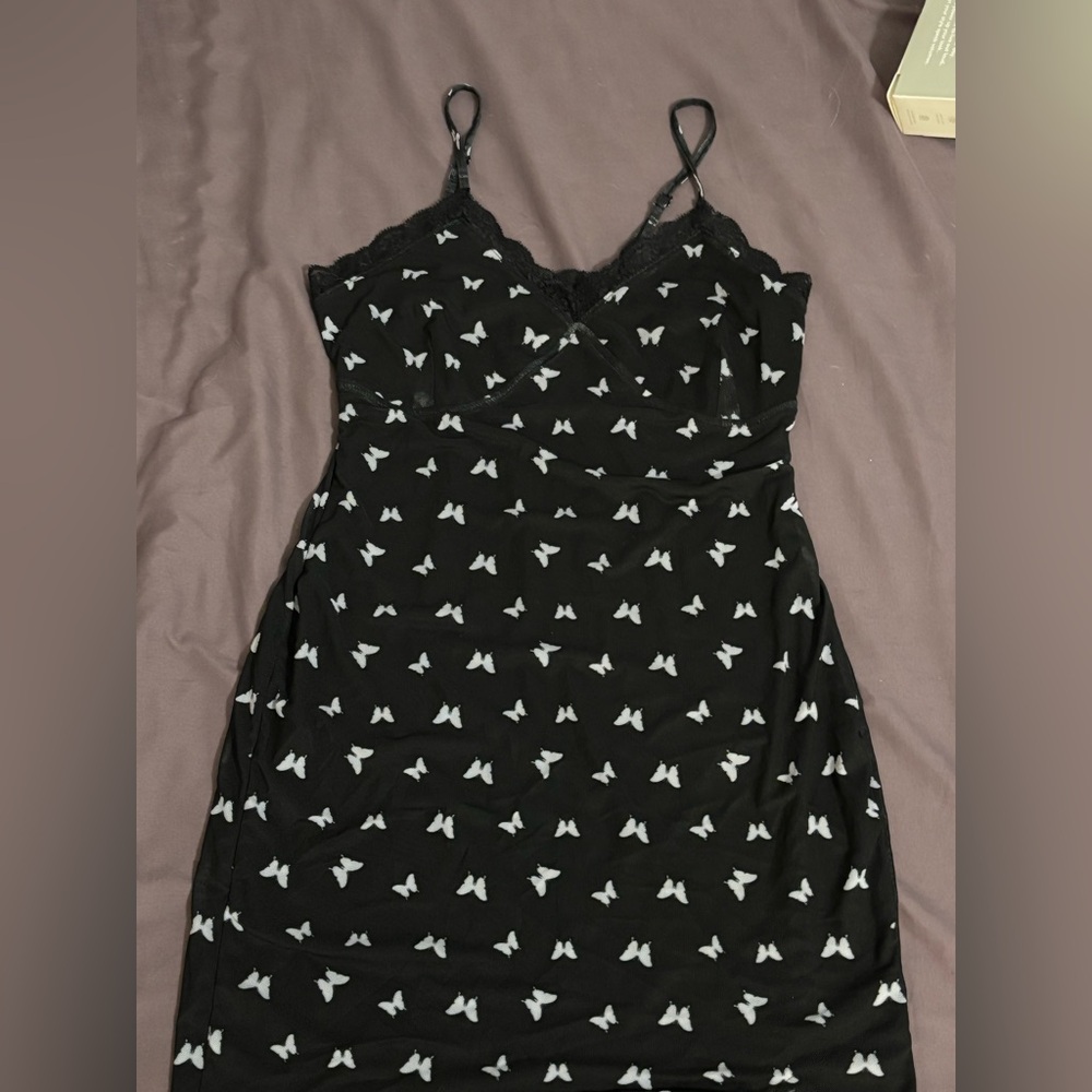 Chic Black Dress with White Butterfly Pattern